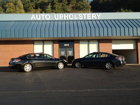 Cover Flip shop front at 2675 Pelham Parkway with the Auto Upholstery sign