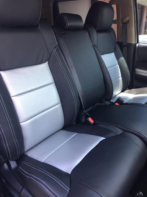 Truck bench seat in black leather with silver centers and white double stitching