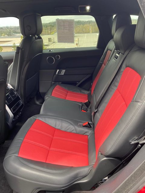Rear bench in black leather with red centers